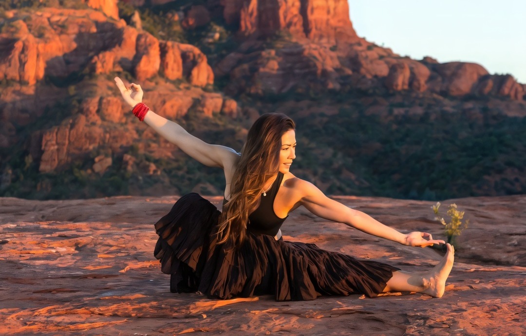 Yoga at sunrise below Cathedral Rock, Sedona
