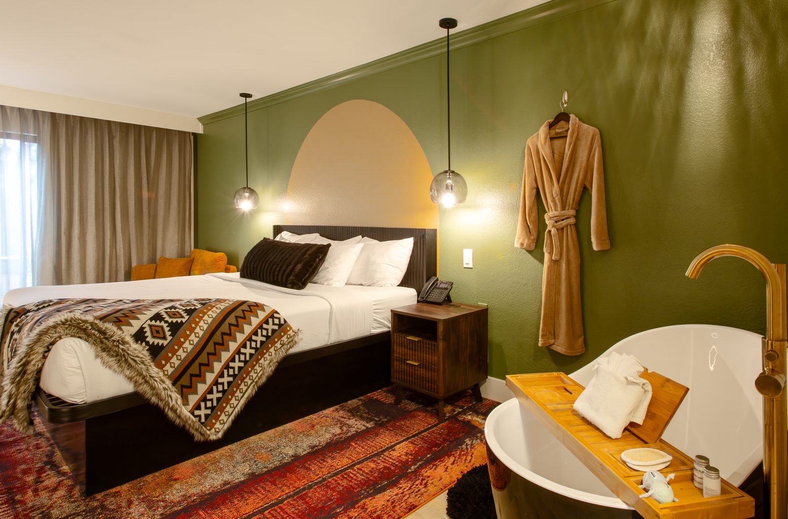 Suite with private soaking tub and plush robe